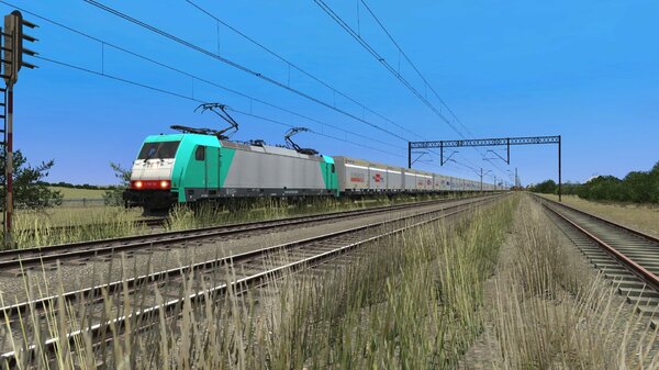 E186-134 con il treno Innofreight che aspetta il verde